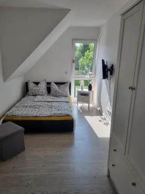 Ein Bett oder Betten in einem Zimmer der Unterkunft Vermietung auf dem Berg