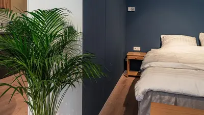 Ein Bett oder Betten in einem Zimmer der Unterkunft Modern Studio Apartment