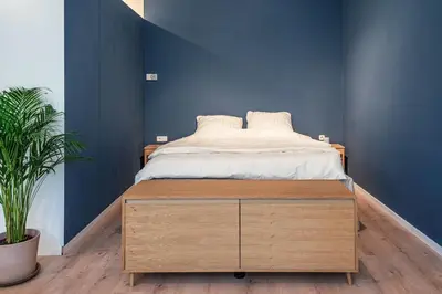 Ein Bett oder Betten in einem Zimmer der Unterkunft Modern Studio Apartment