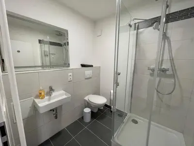 Ein Badezimmer in der Unterkunft Appartementhaus Strausberg-Nord