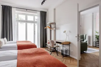 Ein Bett oder Betten in einem Zimmer der Unterkunft oompH Berlin Minimalist & Mighty - 1 BR hosting up to 6