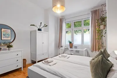 Ein Bett oder Betten in einem Zimmer der Unterkunft Home in Friedrichshain