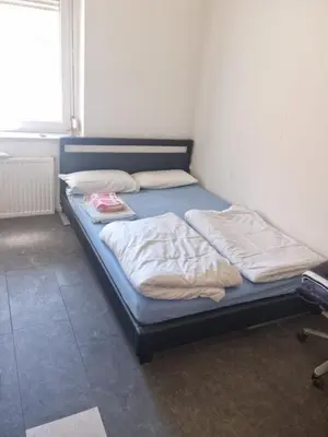 Ein Bett oder Betten in einem Zimmer der Unterkunft Alhambra Suite