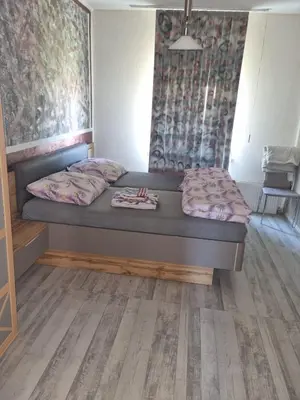 Ein Bett oder Betten in einem Zimmer der Unterkunft Alhambra Suite