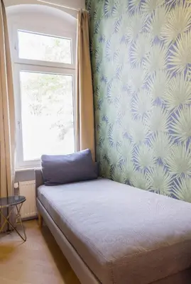 Ein Bett oder Betten in einem Zimmer der Unterkunft StyleApartments #9