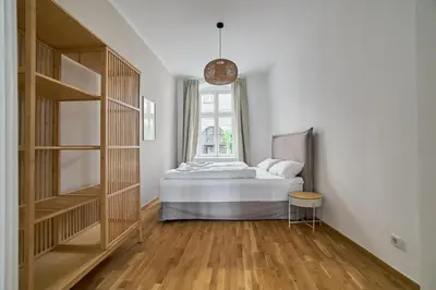 Ein Bett oder Betten in einem Zimmer der Unterkunft Ruhiges zentrales Maisonette-Loft in Berlin
