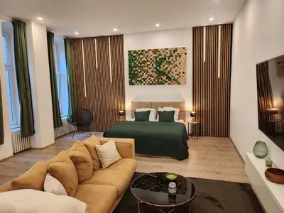 Ein Bett oder Betten in einem Zimmer der Unterkunft Design Apartment mit Loftfeeling in Charlottenburg