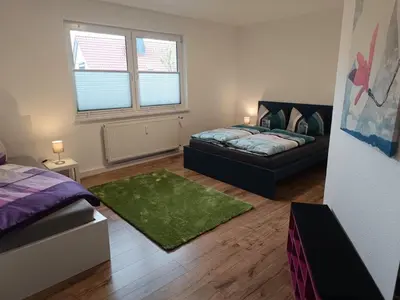 Ein Bett oder Betten in einem Zimmer der Unterkunft NEU! Ferienwohnung am Grimnitzsee