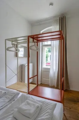 Ein Bett oder Betten in einem Zimmer der Unterkunft Mooeve Flatboxi Apartments
