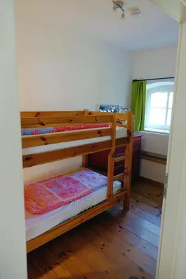 Ein Bett oder Betten in einem Zimmer der Unterkunft Sonnenlandhof