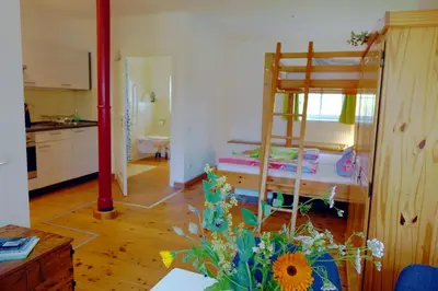 Ein Bett oder Betten in einem Zimmer der Unterkunft Sonnenlandhof