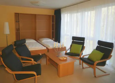 Ein Sitzbereich in der Unterkunft Drei am Zemminsee, Whg Obergeschoss