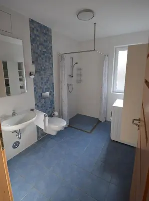 Ein Badezimmer in der Unterkunft Drei am Zemminsee, Whg Obergeschoss