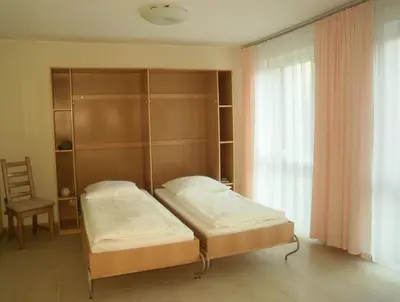 Ein Bett oder Betten in einem Zimmer der Unterkunft Drei am Zemminsee, Whg Obergeschoss
