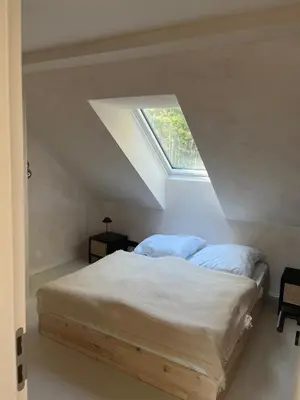 Ein Bett oder Betten in einem Zimmer der Unterkunft Modernes Tiny House im Spreewald