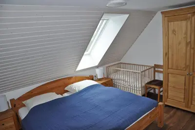 Ein Bett oder Betten in einem Zimmer der Unterkunft Schäferstübchen - Urlaub auf dem Bauernhof