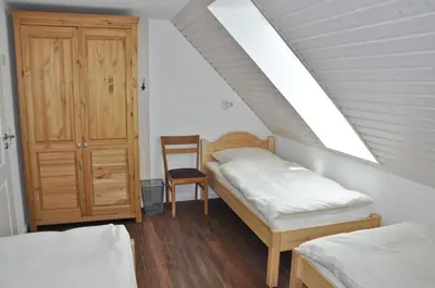 Ein Bett oder Betten in einem Zimmer der Unterkunft Schäferstübchen - Urlaub auf dem Bauernhof