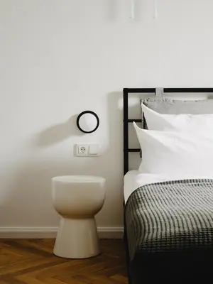 Ein Bett oder Betten in einem Zimmer der Unterkunft NOOK Stay am Checkpoint Charlie