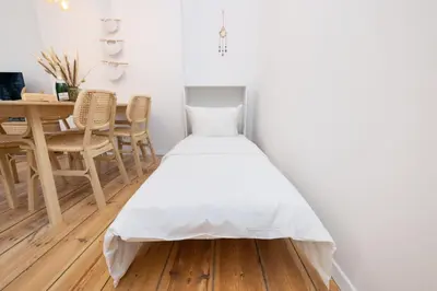 Ein Bett oder Betten in einem Zimmer der Unterkunft SUHU Berlin Apartments