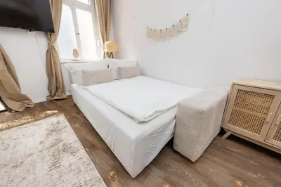 Ein Bett oder Betten in einem Zimmer der Unterkunft SUHU Berlin Apartments