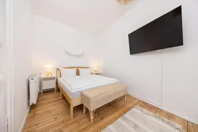 Ein Bett oder Betten in einem Zimmer der Unterkunft SUHU Berlin Apartments
