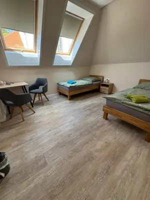 Ein Bett oder Betten in einem Zimmer der Unterkunft Herberge in der Orangerie auf dem Schlossgut Altlandsberg