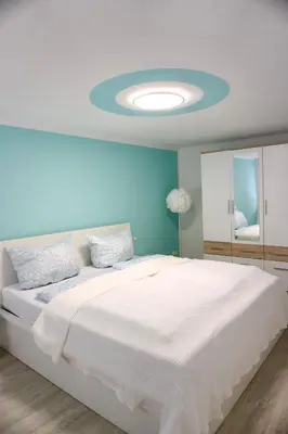 Ein Bett oder Betten in einem Zimmer der Unterkunft Ferienwohnung Sonnenschein