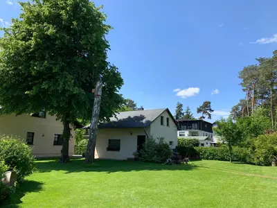 Ein Garten an der Unterkunft Bad Saarow Ferienhaus Am Hafen