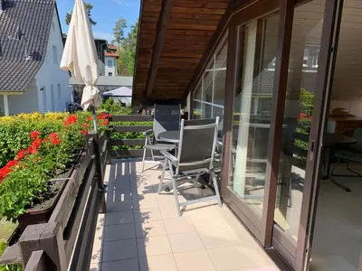 Ein Balkon oder eine Terrasse in der Unterkunft Bad Saarow Ferienhaus Am Hafen