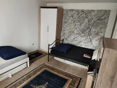 Ein Bett oder Betten in einem Zimmer der Unterkunft holiday AM