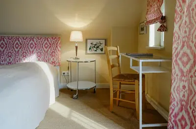 Ein Bett oder Betten in einem Zimmer der Unterkunft Maisonette Apartment In Historic Paretz