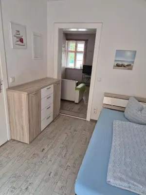 Ein Bett oder Betten in einem Zimmer der Unterkunft Haus am Wendsee