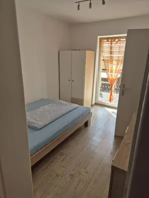 Ein Bett oder Betten in einem Zimmer der Unterkunft Haus am Wendsee
