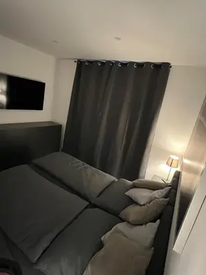 Ein Bett oder Betten in einem Zimmer der Unterkunft Schöne 3-Zimmer-Wohnung mit Klima am Stadtrand von Berlin