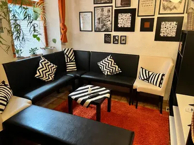 Ein Sitzbereich in der Unterkunft Pension Frosch Hostel
