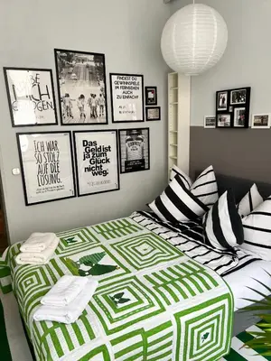 Ein Bett oder Betten in einem Zimmer der Unterkunft Pension Frosch Hostel