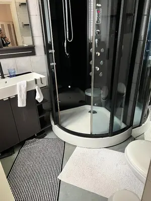 Ein Badezimmer in der Unterkunft Pension Frosch Hostel