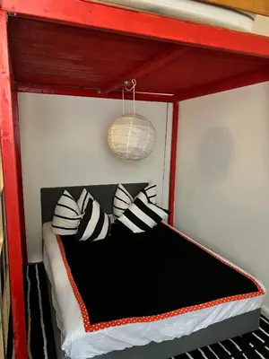 Ein Bett oder Betten in einem Zimmer der Unterkunft Pension Frosch Hostel