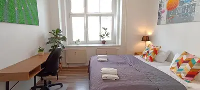 Ein Bett oder Betten in einem Zimmer der Unterkunft Comfortable 2-room apartment for rest & work P-Berg
