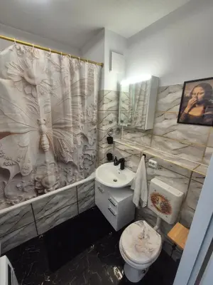 Ein Badezimmer in der Unterkunft Hellersdorf City