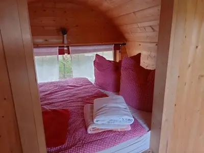 Ein Bett oder Betten in einem Zimmer der Unterkunft TinyHouse 