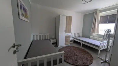 Ein Bett oder Betten in einem Zimmer der Unterkunft FeWo Ertel