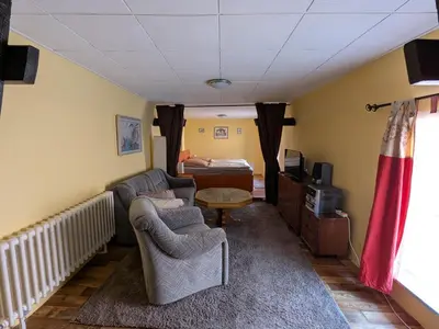 Ein Sitzbereich in der Unterkunft Ferienwohnung Schulz