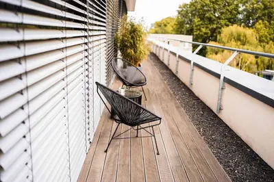 Ein Balkon oder eine Terrasse in der Unterkunft Stralau360 - Exclusive Penthouse with Sauna & Panoramic Rooftop
