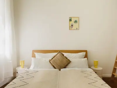 Ein Bett oder Betten in einem Zimmer der Unterkunft NOOK Stay am Tempelhofer Feld