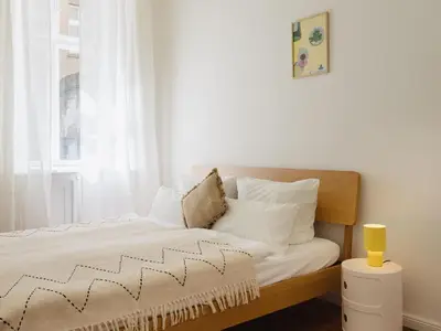 Ein Bett oder Betten in einem Zimmer der Unterkunft NOOK Stay am Tempelhofer Feld