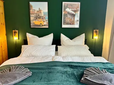 Ein Bett oder Betten in einem Zimmer der Unterkunft Boutique Apartment im historischen Bahnhof - Potsdam & Berlin