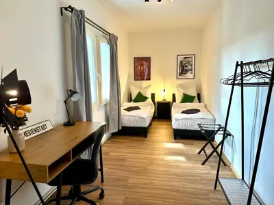 Ein Bett oder Betten in einem Zimmer der Unterkunft Boutique Apartment im historischen Bahnhof - Potsdam & Berlin
