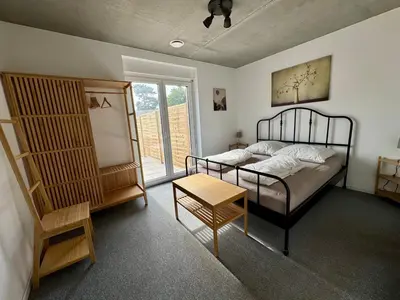Ein Bett oder Betten in einem Zimmer der Unterkunft FeWo Akazie 1 am Scharmützelsee