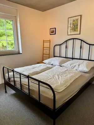 Ein Bett oder Betten in einem Zimmer der Unterkunft FeWo Akazie 1 am Scharmützelsee